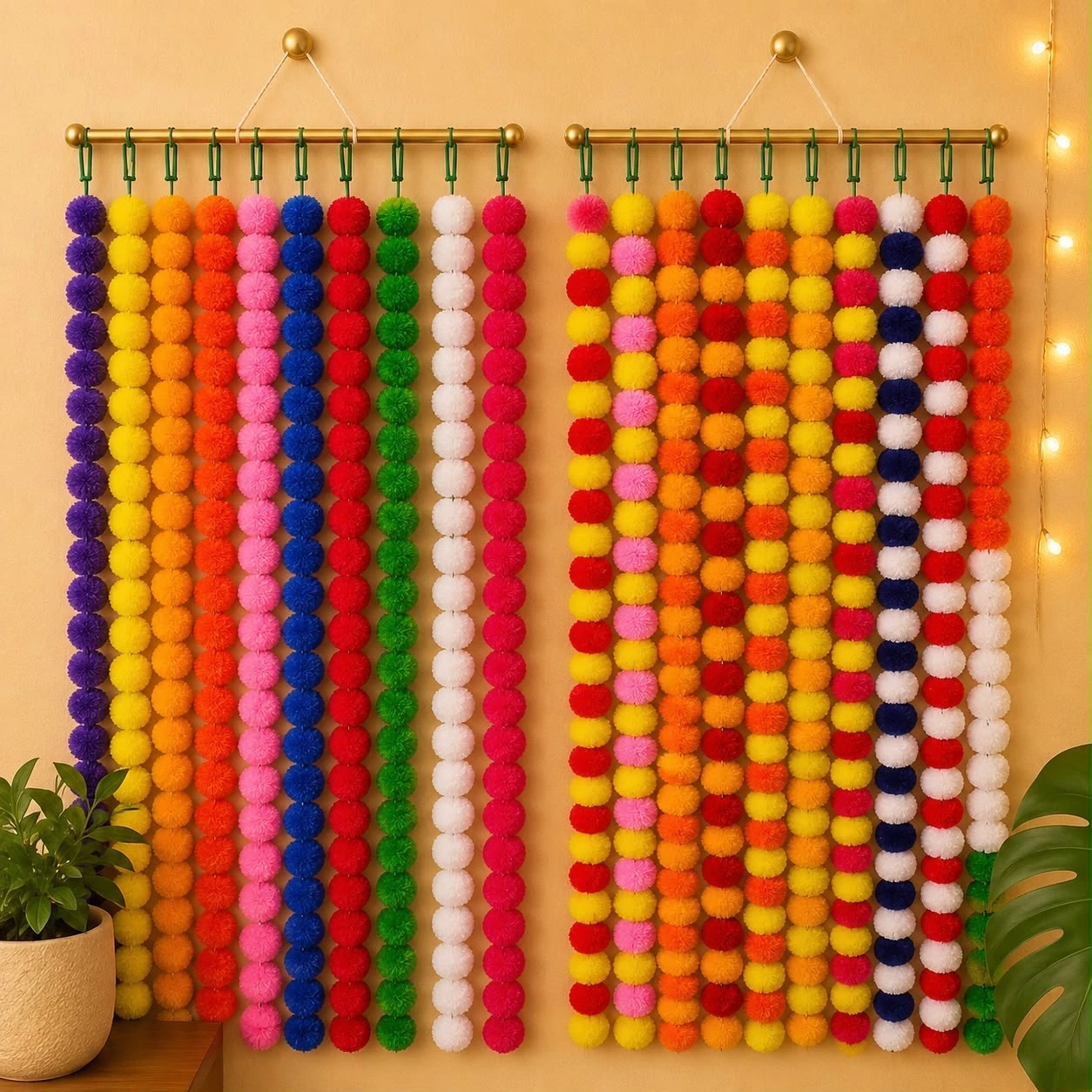 Multicolour pom-pom garland strands in purple, yellow, orange, pink, blue, red, green, white and magenta for Diwali decor