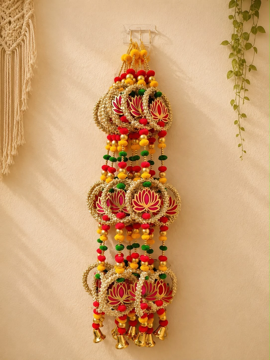 Golden lotus triple-ring Diwali toran with bells
